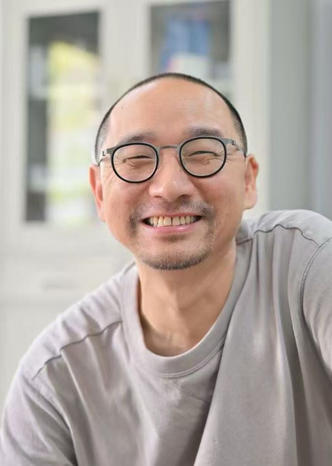 谭炜照片